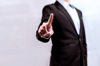商务人士西装人士单手轻触手势